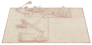 Tactile latex cast of a desk surface and objects by Herbert Stattler, capturing the physical traces, folds, and deformations of a workspace in a flexible, translucent material.
